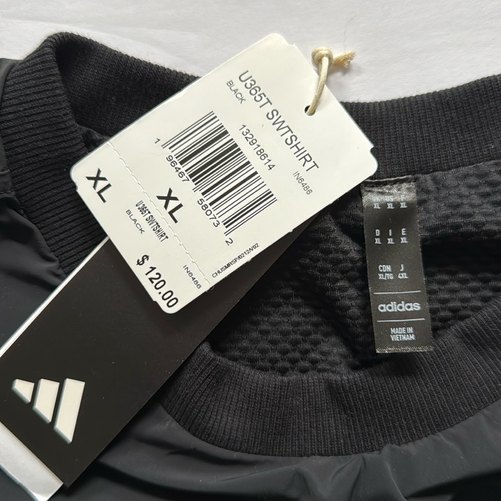 ADIDAS wind breaker for golf.
